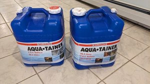 Photo of free Two 7-gallon water jugs (Irving Park/Ashland)