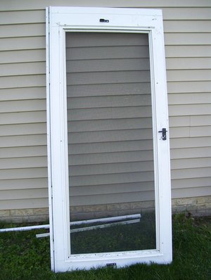 Photo of free Used storm door (Frederick, MD)