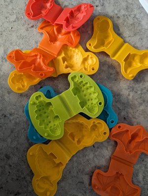 Photo of free Playdough dino molds (63rd& main, DG)