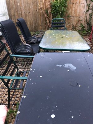 Photo of free 2 x garden tables and chairs (West Bay)