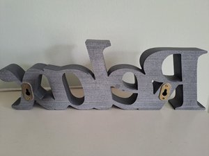 Photo of free Dark Grey 3D Ornamental "Relax" sign (Surrey Heath GU16)