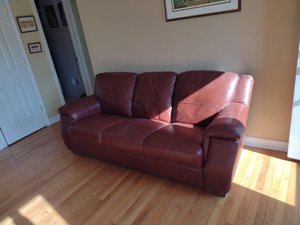 Photo of free Leather couch (208 N. Owen st)