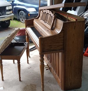Photo of free Wurlitzer piano with bench (Dover DE)