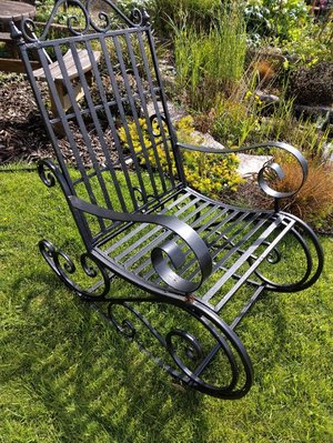 Photo of free Black painted metal garden rocking chair (Galmpton TQ5)