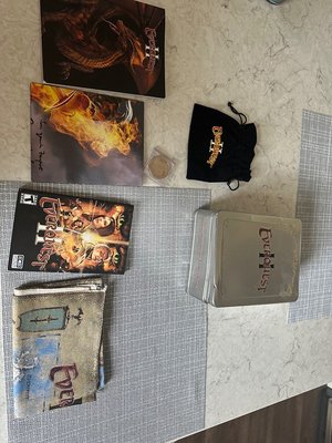 Photo of free EverQuest II maps and book (Dundee & Hicks Palatine)