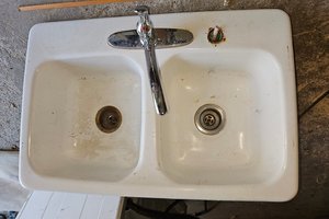Photo of free Cast Iron sink with faucet (Aromas)