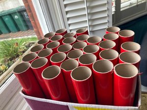 Photo of free 34 x red cardboard tubes (Preston park BN1)