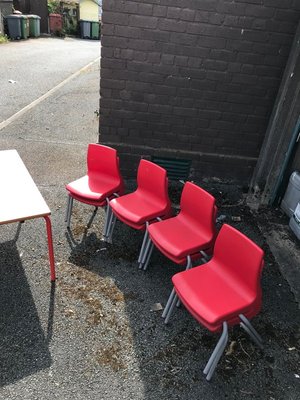 Photo of free 8 Infant reds chairs and 1 red table. (Little Neston CH64)