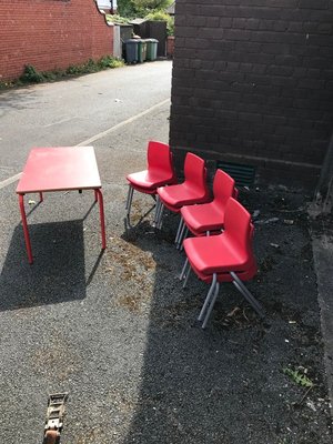 Photo of free 8 Infant reds chairs and 1 red table. (Little Neston CH64)