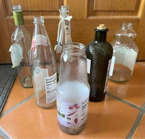 Photo of free Glass Bottles and Jars (NE Heights)