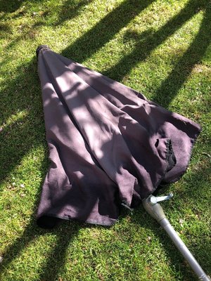 Photo of free Huge 2.4m black sun umbrella needs re threading (Wallands Park BN7)
