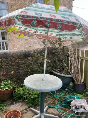 Photo of free Plastic garden table with umbrella (Storrs S6)