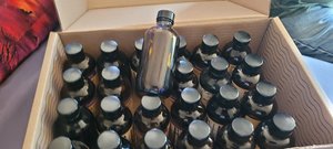 Photo of free 4 oz brown bottles with caps (Near Baldwin and Spaight)