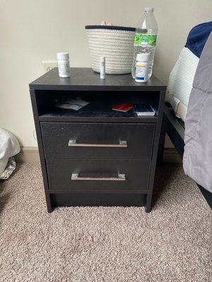 Photo of free Black nightstand (Station Nine Apartments)