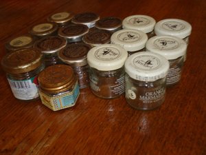 Photo of free A quantity of very small glass jars w. metal screw lids (Willingdon BN20)