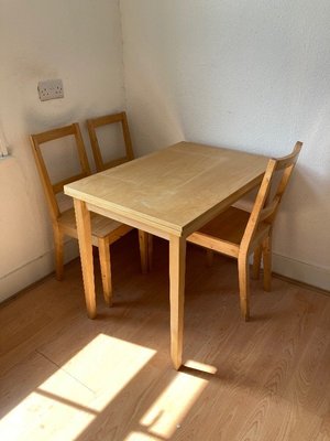 Photo of free Dining table and 4 chairs (Eastbourne BN21)