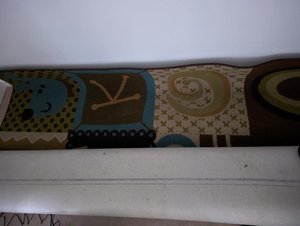 Photo of free 8'x10' alphabet rug, synthetic (Chelsea Cove North)