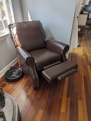 Photo of free Leather recliner (63rd& main, DG)