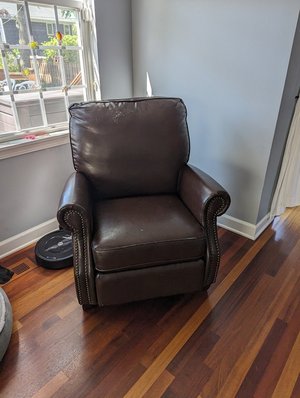 Photo of free Leather recliner (63rd& main, DG)