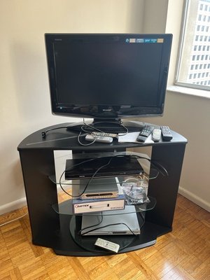 Photo of free Tv and stand (Bay and Bloor)
