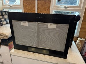 Photo of free Beaumatic chimny style black extractor hood 700mm wide (Bearpark DH7)