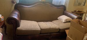 Photo of free Wood and leather couch (Waterloo and sooner)