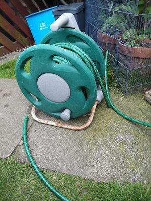 Photo of free Green hosepipe on reel (Craiglockhart EH14)