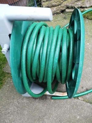 Photo of free Green hosepipe on reel (Craiglockhart EH14)