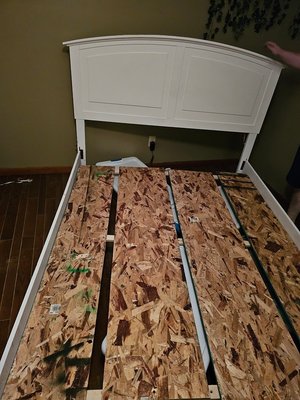 Photo of free Queen size bed frame (Behind Casey's gas station)