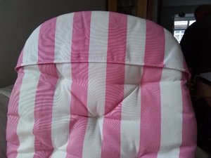 Photo of free 2 outdoor chair cushions, each with cigarette burn (North Town SL6)