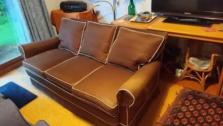 Photo of free Sofa. Small three-seater (West Wimbledon)