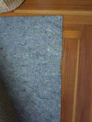 Photo of free 8x10 Wool rug with pad (Belmont)