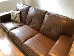 Photo of free Brown leather sofa (N12)