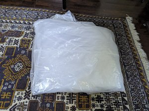 Photo of free Large plastic bag queen mattress (94040)