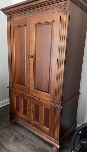 Photo of free Large Hooker armoire (5401 North)
