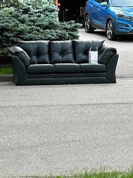 Photo of free Faux leather couch (North Waterloo)