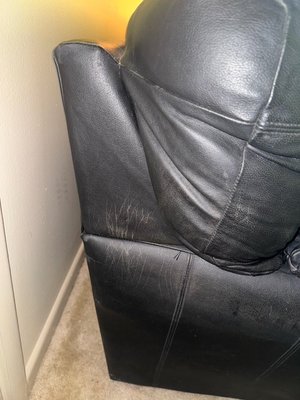 Photo of free Black Leather Couch (North Deering)