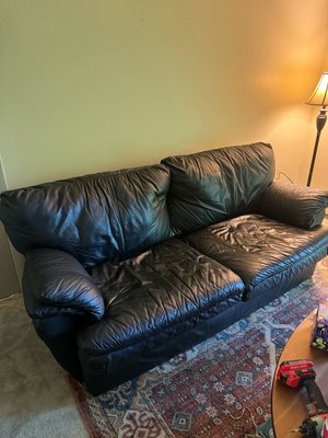 Photo of free Black Leather Couch (North Deering)