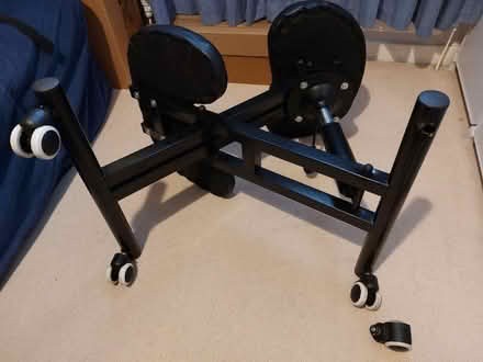 Photo of free Black ergonomic kneeling chair with a broken wheel (Wetherby LS22)