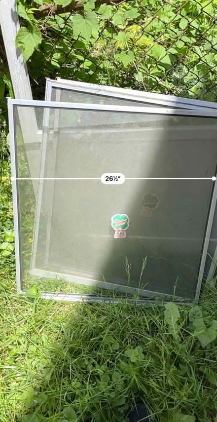 Photo of free Aluminum storm door frame (20910)