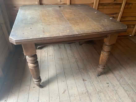 Photo of free Large antique extending table (Billericay)