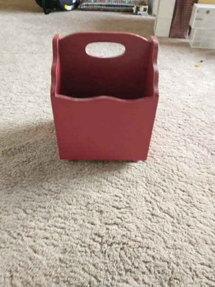 Photo of free Red wooden magazine holder (Meriden off Curtis st)