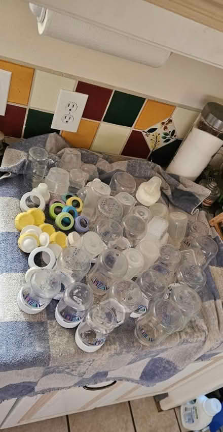 Photo of free Baby Bottles and lids (Carlisle / Gibson)