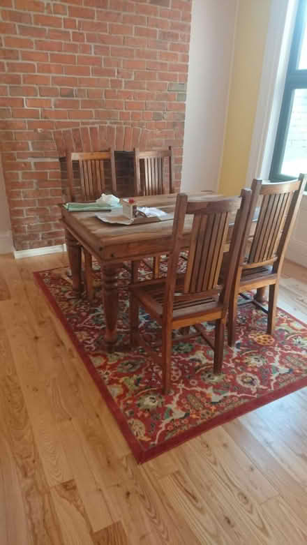 Photo of free Solid wood dining table and 4 chairs (BT7)