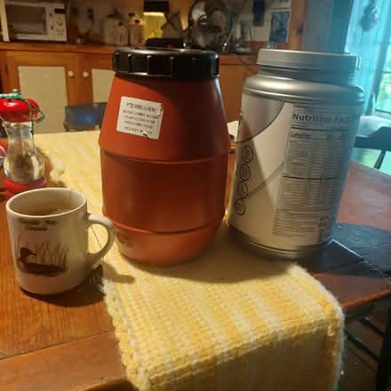 Photo of free Empty pro powder and olive jugs (Oswego) #1