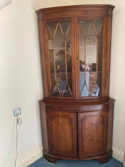 Photo of free Wooden corner cabinet. (St Oswalds GL1)