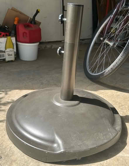 Photo of free Concrete wheeled umbrella stand (South Wheaton)