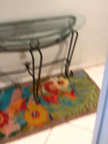 Photo of free Wrought iron and glass table (10th St Naples)