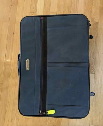 Photo of free old fashioned suitcase on wheels (near Old Town Gaithersburg) #1