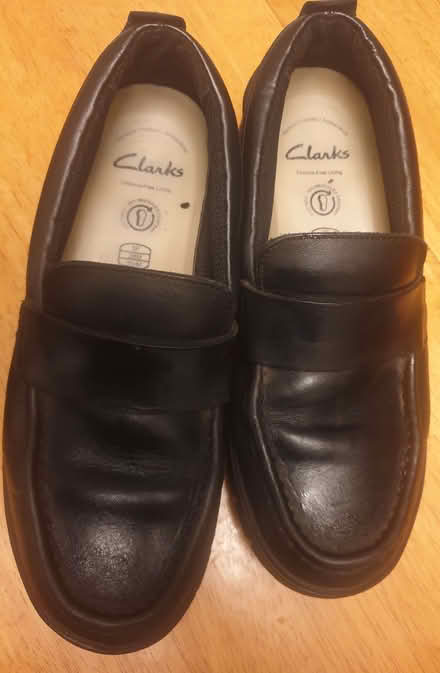 Photo of free Clarks black leather shoes, boys, size 5.5F (Battle TN33) #1